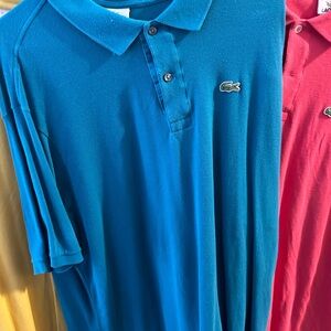 I’m selling a lot of 4 Vintage Lacoste polos. Size 9(XL)